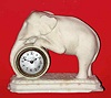 C.1900, Lux Clock Mfg Co., Waterbury, Conn, ELEPHANT novelty, the clock set into a parian figure of an elephant pushing a barrel.
