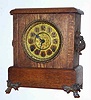 C.1912, Sessions Clock Co., JEWEL, oak cased mantel clock, 8-day time and gong strike with half hour bell.