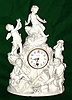 C.1890, French, Pottery figural clock in the Parian style, white with fine detail, the movement a typical Japy timepiece, 8-day spring depicting 5 cherubs at play.