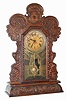 C.1910, E. Ingraham GILA, Time, strike and calendar pressed oak gingerbread clock, 8-day.