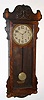C.1914, New Haven Clock Co., 8-day wall timepiece. This is the case that was used in the double dial version called the Rutland.