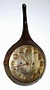 C.1905, Waterbury Clock Co., 30-hour alarm timepiece novelty mounted in a steel frying pan with raised numerals, riveted to the pan.