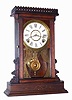 C.1885, E. N. Welch Mfg. Co., 8-day time and gong strike walnut mantel clock, with restorations.