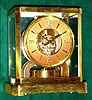 C.1955, Swiss, LeCoultre, ATMOS, perpetual running clock in a brass and glass case, serial 54,980.