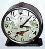 C.1933, Westclox, LaSalle, Ill, "EARLY BIRD" , 1- day novelty alarm, showing a rocking robin pulling a worm from the ground.