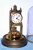 C.1905, German, Gustav Becker, 400-day Disc pendulum clock with glass dome, and with original beat set adjuster on top and gilt floral trim piece under the dial, serial No. 199.