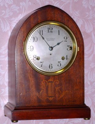 Seth Thomas, Chime Clock No. 64, 5-bell Sonora, with alternate "lyre" inlay below dial, mahogany case. C. 1914. — Antique Clocks Price Guide