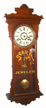 Welch, Spring and Co., SEMBRICH, time and gong strike wall clock, in black walnut, with ad glass for STARR, the Jeweler. C. 1885. — Antique Clocks Price Guide