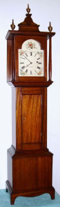 Mahogany grandmother clock, with a signed, period Howard and Davis, Boston, regulator movement, with 70 beat pendulum, and painted arched dial. C. 1970. — Antique Clocks Price Guide