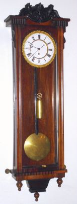 Austrian, Viennese timepiece, 8-day, 1-wt, in a late Biedermeier case, 2-piece dial and cast bezel. C. 1860. — Antique Clocks Price Guide