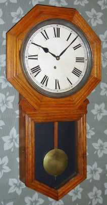 E. Ingraham and Co., "COMMERCIAL" long drop octagon school clock, time only. C.1911. — Antique Clocks Price Guide