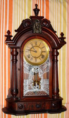 Connecticut shelf clock, 8-day brass time and strike movement in black walnut case with full round fluted columns, spring driven. C. 1880. — Antique Clocks Price Guide