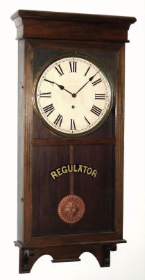 E. Ingraham and Co, mahogany finished poplar cased store timepiece, 8-day, spring. This is a depression era Western Union model, similar to Sessions Regulator 2 and 4. C.1935. — Antique Clocks Price Guide