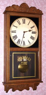 New Haven, New Haven Conn, "REFEREE" model, 8 day time only brass mvt in oak case with 12" dial, spring driven. C. 1911. — Antique Clocks Price Guide