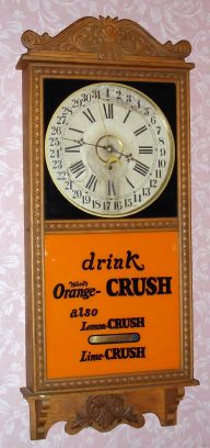 Gilbert Clock Co, Winsted Conn, "OBSERVATORY" calendar model, 8 day time brass mvt in oak case with reproduction "drink Ward's Orange CRUSH also Lemon-CRUSH Lime-CRUSH" orange and black painted tablet , spring driven. C. 1913. — Antique Clocks Price Guide