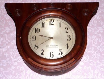 Seth Thomas, Thomaston, Conn. "DOUBLE DIAL CEILING" model, 30 day time double spring brass mvt No. 86 in mahogany case with concentric raised mahogany accents with 14" metal dials, private label for "GEO. P. THOMAS 64 LINDEN ST. BROOKLYN. N.Y." C. 1935. — Antique Clocks Price Guide
