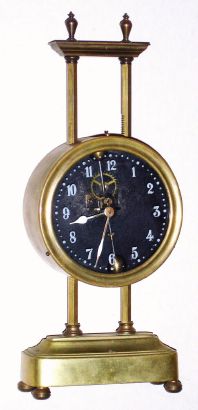 French, brass cased gravity clock, one day, with glass dial showing compound pendulum. C.1920. — Antique Clocks Price Guide