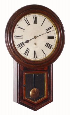 E. N. Welch, Forestville, Conn, "ROUND HEAD" model, 8 day time brass mvt (clubfoot escapement) in rosewood veneer case with 12" dial, spring driven. C. 1880. — Antique Clocks Price Guide