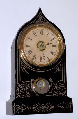 Terry Clock Co., Waterbury, Conn, iron cased alarm clock, 8-day time and bell strike. C.1860. — Antique Clocks Price Guide