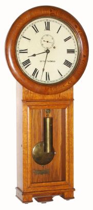 Seth Thomas Clock Co., "REGULATOR No. 2", in oak, round drop station regulator, weight driven, 8-day. C.1890. — Antique Clocks Price Guide