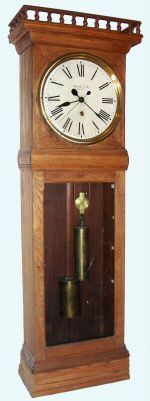 Tiffany and Co., New York, cut down "built in" timepiece probably from a hotel or public building, with a marvelous weight driven movement with fully adjustable pallets, maintaining power, and center seconds. C.1890. — Antique Clocks Price Guide