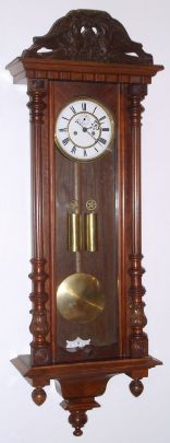 German, Gustav Becker, 2-Wt Vienna Regulator, serial No. 1089648, in a walnut case with fluted side columns, 8-day gong striking, case with restorations, C.1895. — Antique Clocks Price Guide