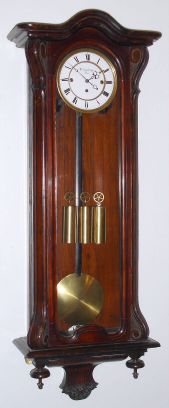Austrian, W. Schonberger, 3-Wt, Grand Sonnerie wall clock, in a grained rosewood case with simple lines. C.1860. — Antique Clocks Price Guide
