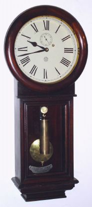 New Haven Clock Co., "SATURN", round drop timepiece, 8-day weight driven. C.1911. — Antique Clocks Price Guide