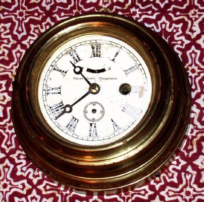 Waterbury Clock Co., 4 Inch Lever Timepiece, in a spun brass case with wooden back, 30-hour. C.1890. — Antique Clocks Price Guide