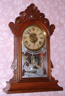 Wm. L. Gilbert Clock Co., "PAROLE", walnut cased parlor clock, time and gong strike, 8-day, spring. C.1885. — Antique Clocks Price Guide