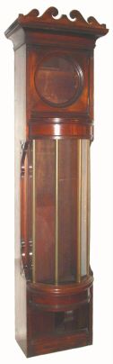 American Case only, custom made to match a mahogany parlor set, with a bow front, slide-out door, will fit most any large movement with 12.3" bezel and up to 10" deep; currently set up for a pinwheel movement with front hung pendulum. C.1900. — Antique Clocks Price Guide