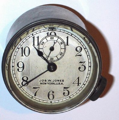 American Boat Clock, unknown maker, but nice quality and retailed by Jos. W. Jones, New York in a nickeled case with screw bezel and large stem wind / set knob at 4 o'clock. Appears to be 8 day. C.1925. — Antique Clocks Price Guide