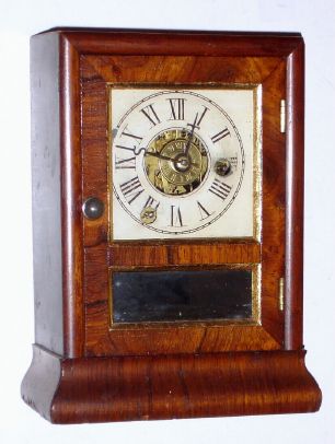 Seth Thomas Clock Co., "Cottage C", flat top with OG bottom, 30-hour time/alarm cottage timepiece with a C-type movement, Plymouth Hollow label. C.1860 — Antique Clocks Price Guide