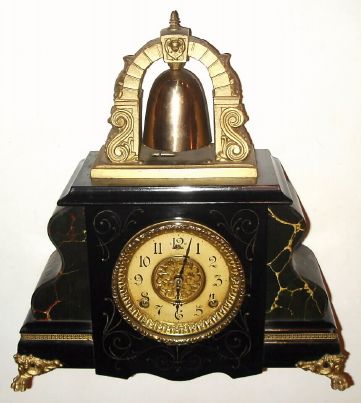 William L. Gilbert Clock Co., "Curfew", 8-day time and bell strike mantel clock. C. 1905. — Antique Clocks Price Guide