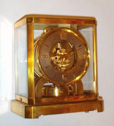 LeCoultre "Atmos" or self winding, perpetual running clock, wound by changes in temperature and pressure, serial No. 41120. C. 1951. — Antique Clocks Price Guide