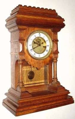 E. N. Welch Mfg. Co., "Khedive", 8-day time/strike Patti movement shelf clock, an uncommon clock in oak. Circa 1889. — Antique Clocks Price Guide