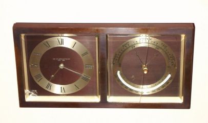 Chelsea Bronze, strut desk set in rectangular bronze frame, clock to left and barometer to right, with thermometer in center, serial No. 196514, retailed by Abercrombie and Fitch, New York, C.1930 — Antique Clocks Price Guide