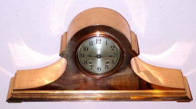 Chelsea Clock Co., for Tiffany and Co., New York, TAMBOUR No. 23, in red brass, presentation engraved on rear: "Ruth Osborn, In loving appreciation of her faithful and successful work, Girl Scout Council of the Oranges". House strike on gong. Serial 162865. C.1925 — Antique Clocks Price Guide