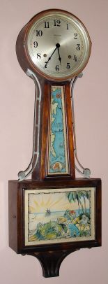 E. Ingraham and Co.," Treasure or Treasure Island", 8-day time/strike banjo clock. Circa 1934 — Antique Clocks Price Guide