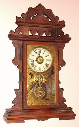 E. N. Welch Mfg. Co., "Donita", 8-day time and cathedral gong striking, with bell alarm, mantel clock. Circa 1882. — Antique Clocks Price Guide