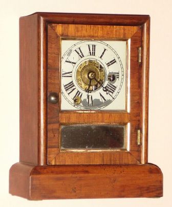 Seth Thomas Clock Co., "Cottage C", 30-hour time and alarm miniature cottage clock. Circa 1870 — Antique Clocks Price Guide