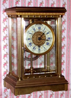 Boston Clock Co., DELPHUS model crystal regulator, tandem wind, with damaskeen plates, serial No. 7436, eight-day, C.1890 — Antique Clocks Price Guide