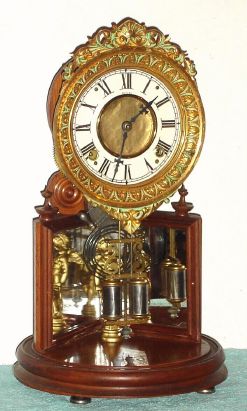 H. J. Davies, New York, CRYSTAL PALACE, time and cathedral gong strike with angled mirrors to accent the pendulum swinging. C.1875 — Antique Clocks Price Guide