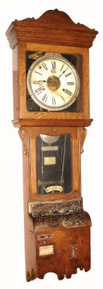 International Time Recording Co., Binghampton, NY, large and early version of their time punch clock shortly after they took over the Bundy company, and with auxiliary calendar feature wound at 11, C.1908 — Antique Clocks Price Guide