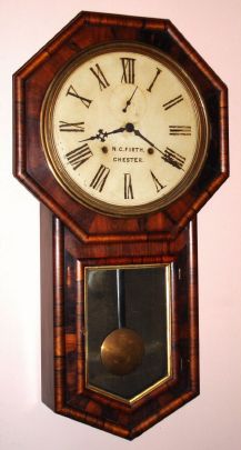 E. N. Welch Mfg. Co., "VERDI", 8-day time and strike octagon long drop wall clock. Circa 1878 — Antique Clocks Price Guide
