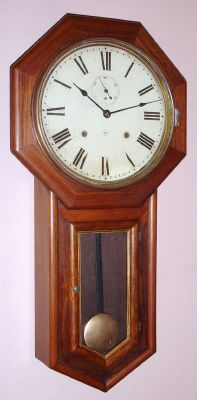 Seth Thomas Clock Co, "WORLD", 8-day time and gong strike long drop octagon school clock, C.1910 — Antique Clocks Price Guide