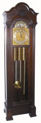 Waltham Clock Co., Waltham, Mass, model 561 (numbered 19242-561) with heavy No. 52 five tube movement and No. 3 arch dial with rolling moon and cast brass decorations, 3-wt, quarter chime hall clock. — Antique Clocks Price Guide