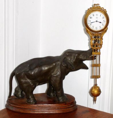 German, Junghans, ELEPHANT swinger or mysterious swinging timepiece, the clock arm moving from side to side without apparent impulse, C.1910 — Antique Clocks Price Guide