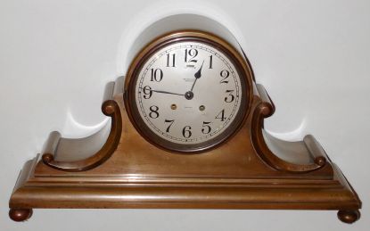 Chelsea Clock Co., Boston, "TAMBOUR No. 5", house strike in a brass case with mellow bronze finish, 6.5" dial, serial 140322, retailed by Wm. Wise and Sons, Brooklyn, C.1920 — Antique Clocks Price Guide