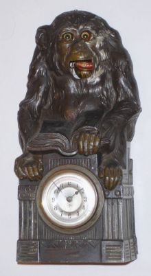 German, Junghans, Monkey automaton clock, eyes move and lower jaw moves up and down while clock is running, C.1915 — Antique Clocks Price Guide